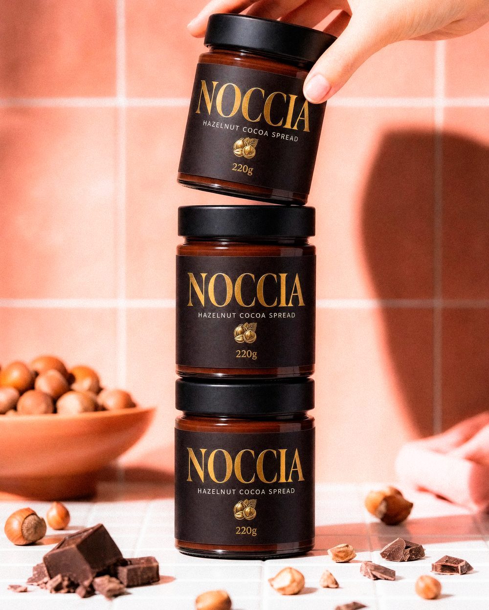 Four identical NOCCIA jars arranged in a vertical stack