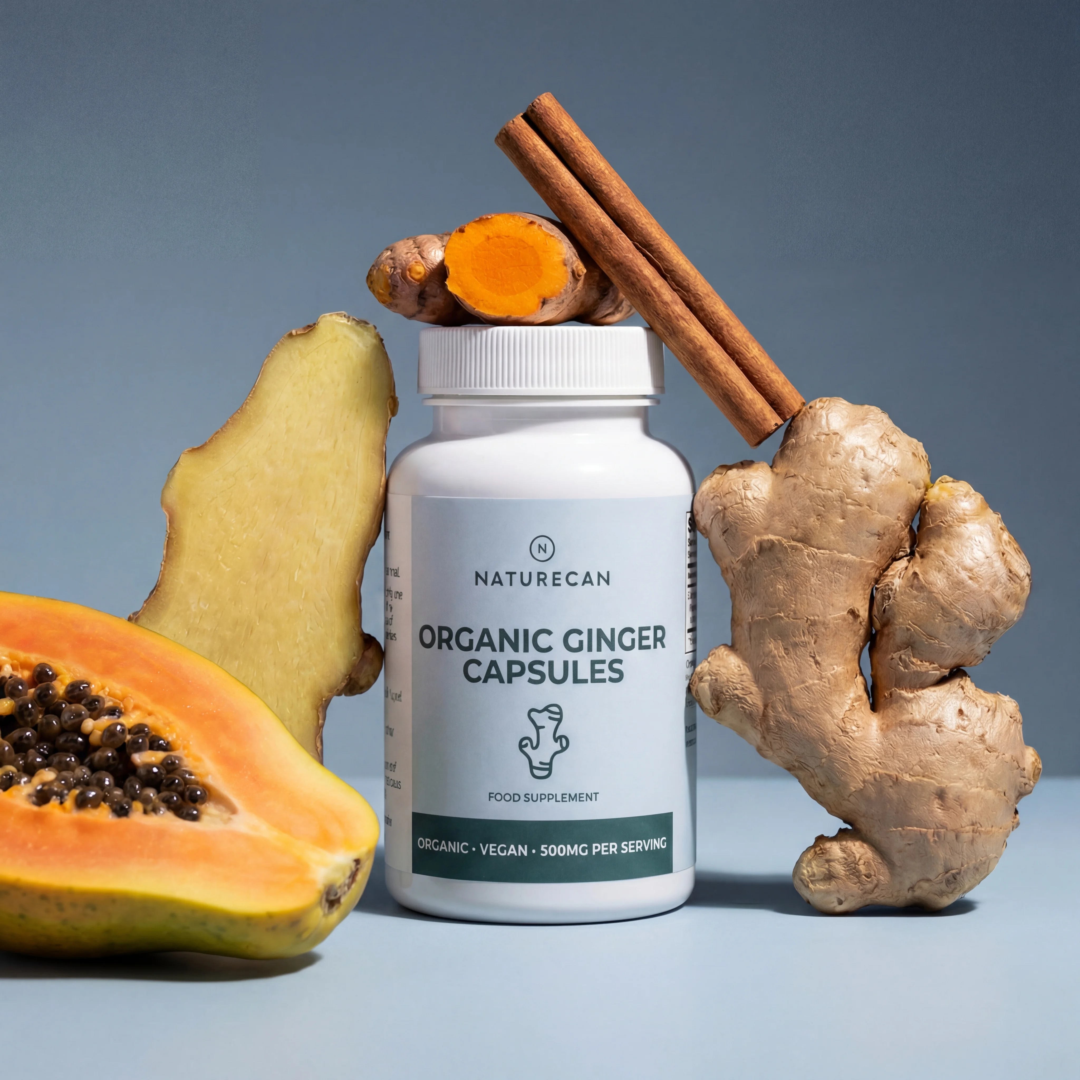 Naturecan organic ginger capsules surrounded by ginger, turmeric and papaya