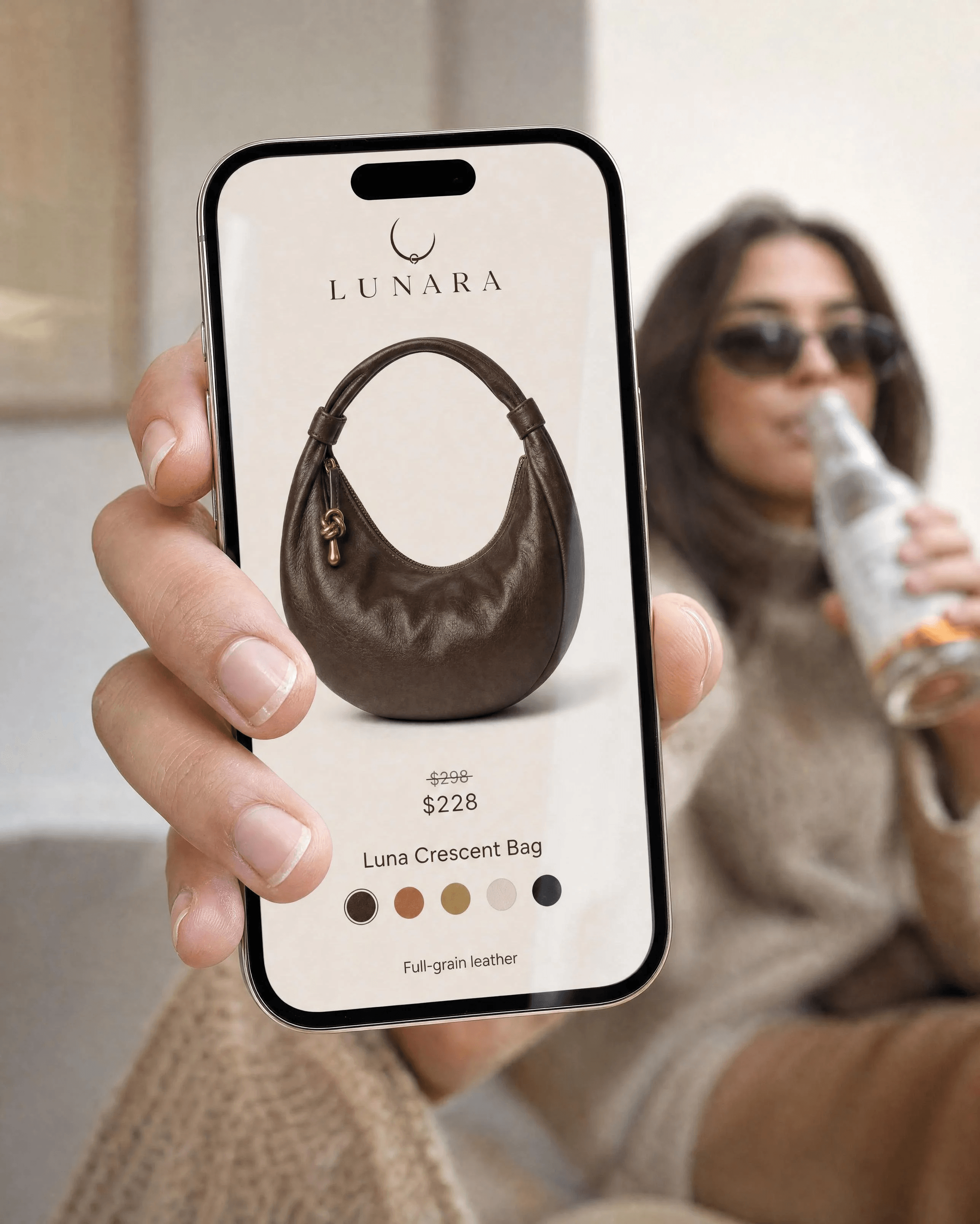 LUNARA: The Crescent, On Screen — Held up to camera — the product page, the price, the swatches