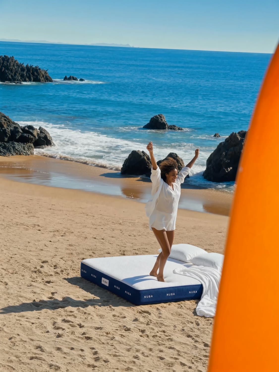 Model stretching on a NUBA mattress on a rock beach