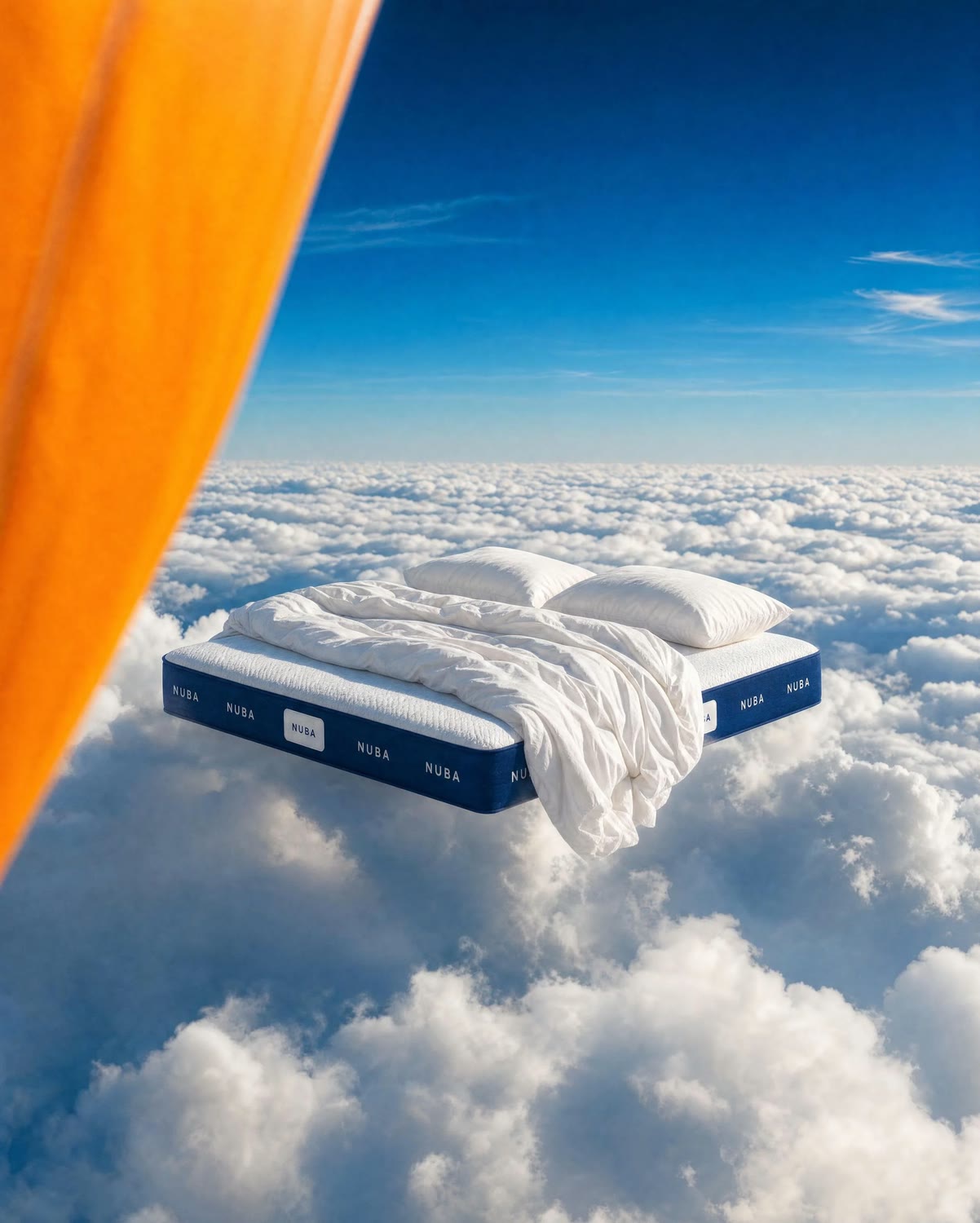 NUBA mattress floating alone above a sea of clouds