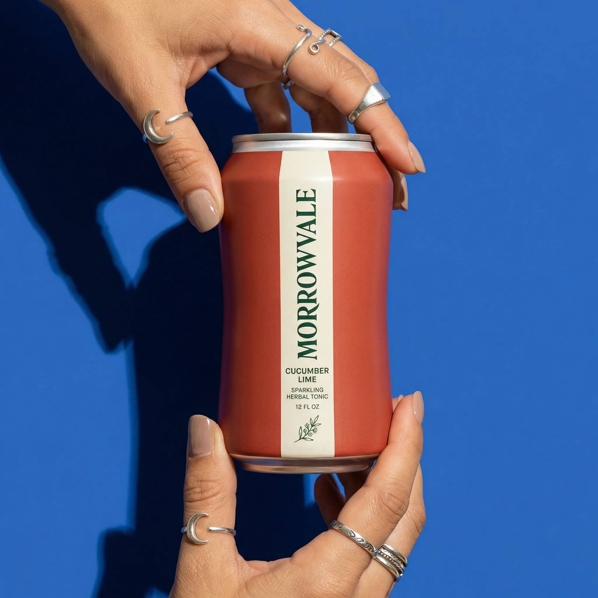 Herbal Tonic In Hand scene example for Product-in-Hand Photography