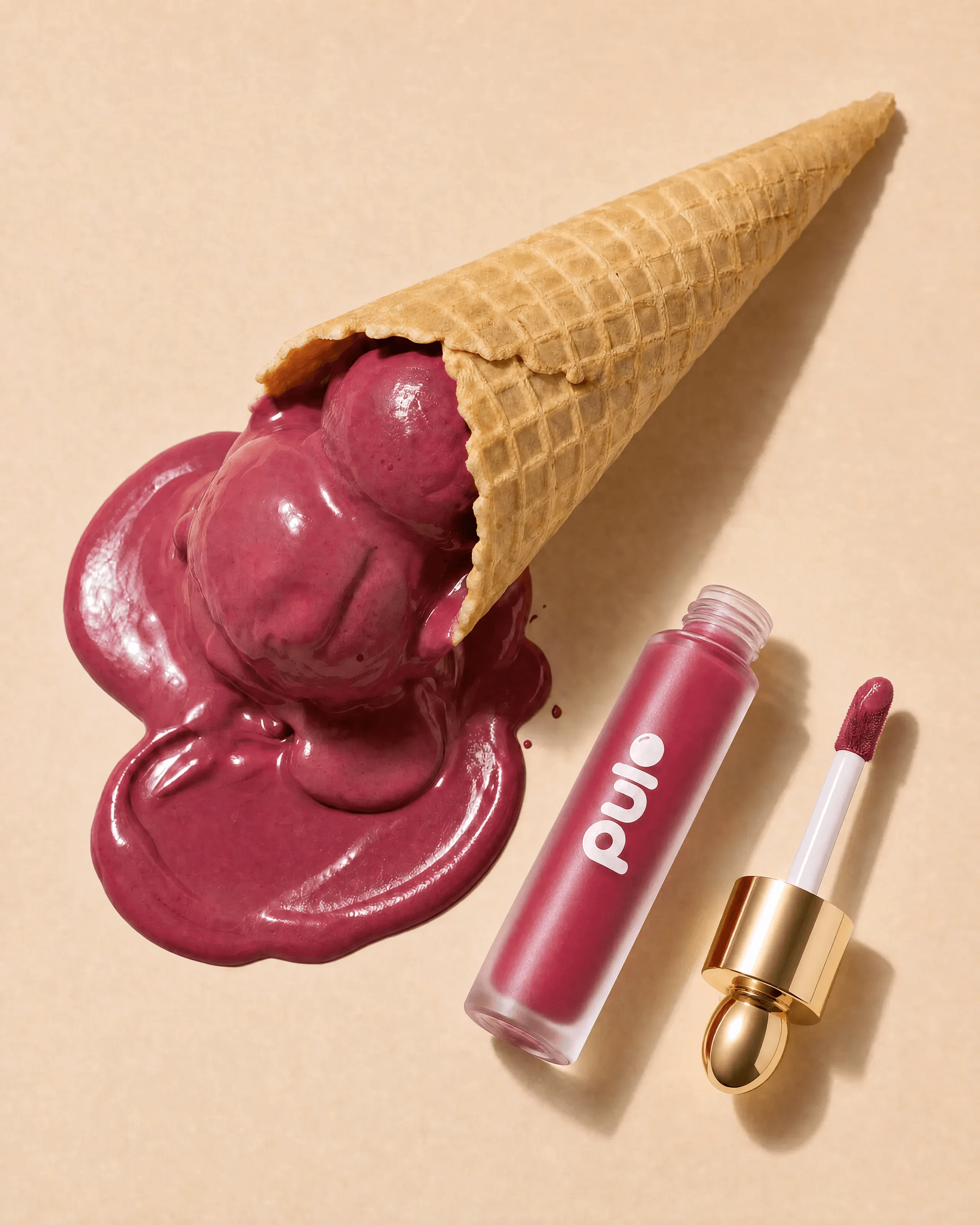 PULP: The Melt — Melting scoop in the hero shade, bottle resting beside it