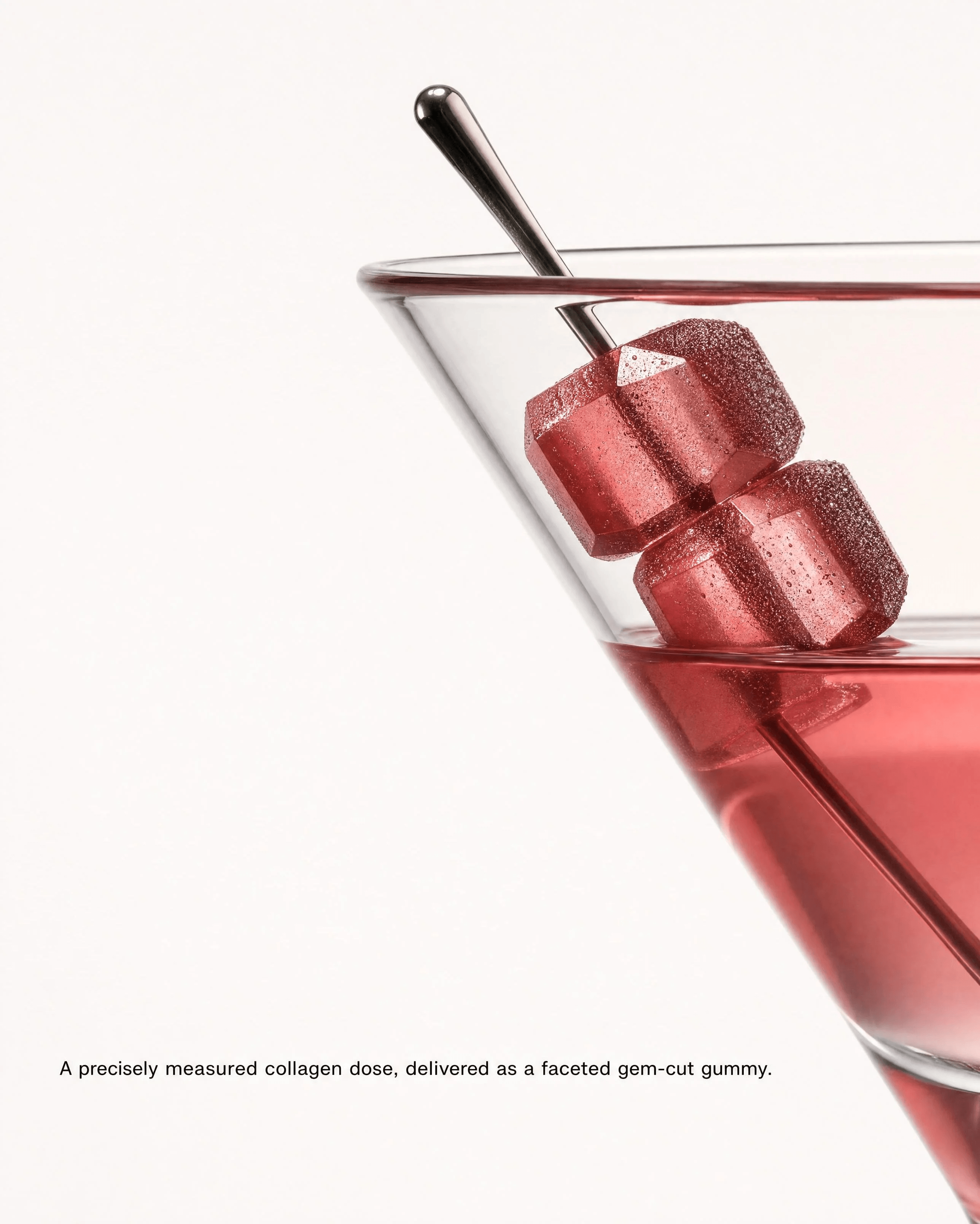 VITRIA: Precision Over Powder — Two Raspberry gummies resting in a glass